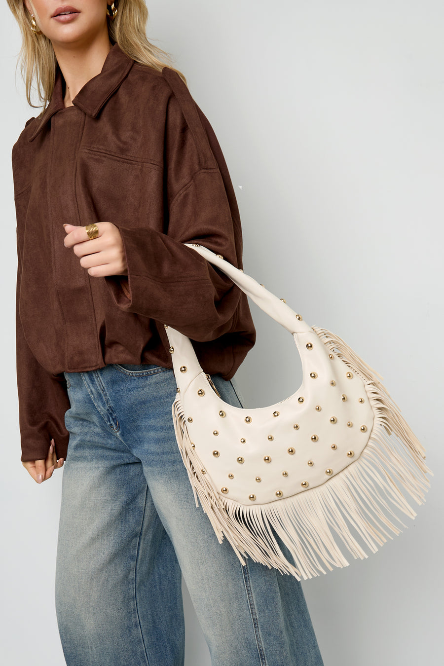 Bolso de mano con tachuelas